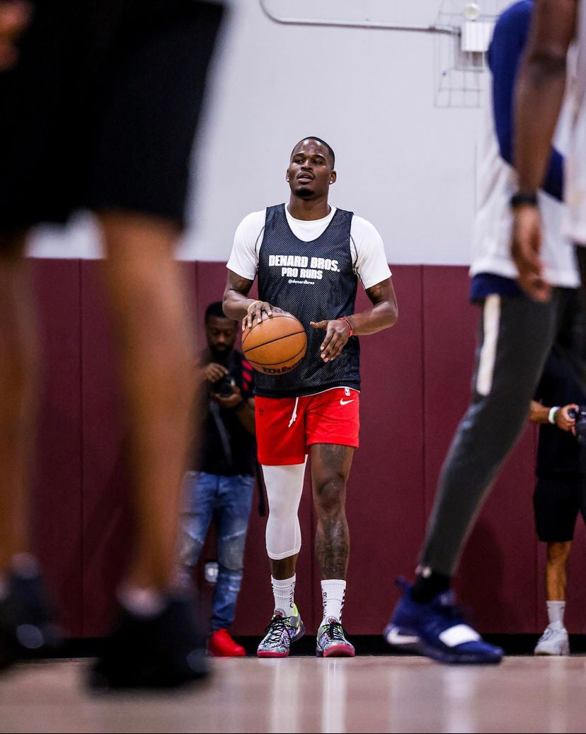 Javonte Green wearing LVLS white Single Leg Tights while playing pickup basketball